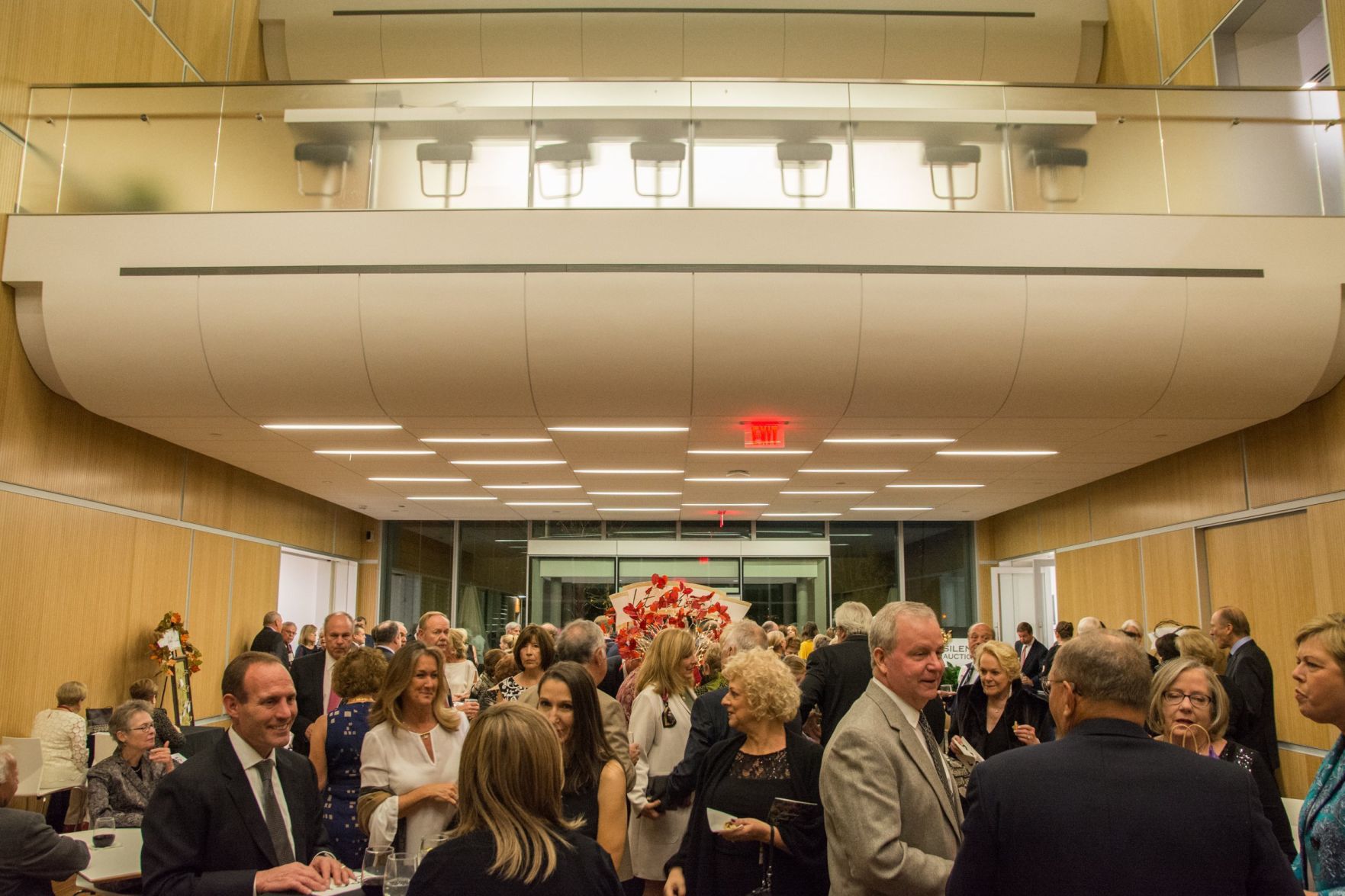 Guests enjoy cocktail hour in the lounge of the event